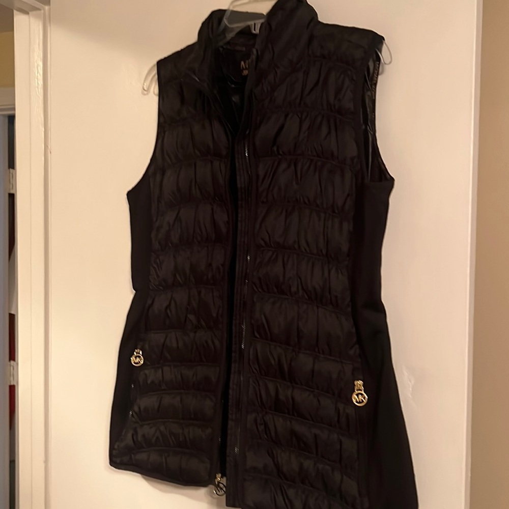 Micheal kors puffy vest. Size large.  Perfect condition